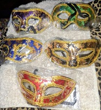 5 masquerade ball/occasions masks. Gold: Purple, Blue, Green, Black and Red.