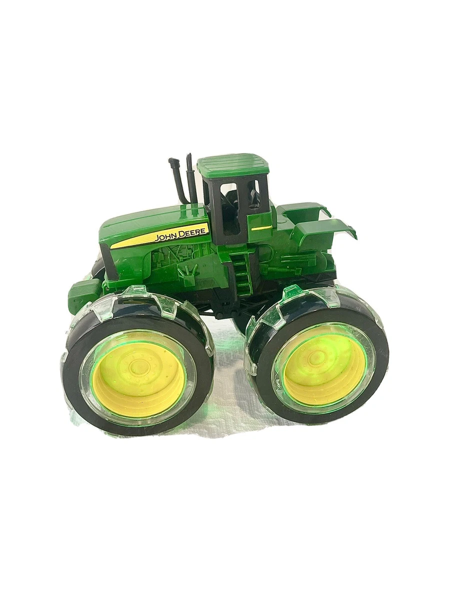 Ertl john deere tractor with lightning wheels sales