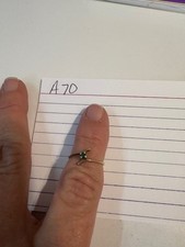 .925 Sterling Silver size 4.5 modern bypass ring with small green Emerald