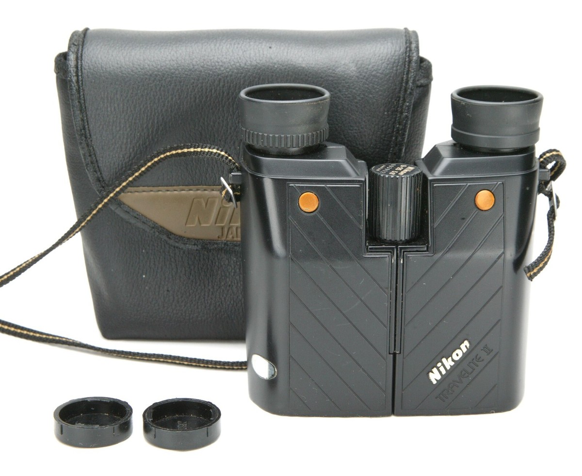 Nikon Travelite II Compact Size Binoculars 9x25 & 5.6°. Case