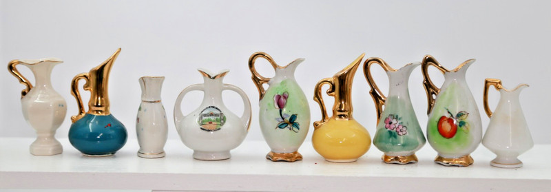 9 Collectible Pitchers.  #125