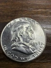 1959 Uncirculated Franklin Half Dollar Actual Coin. Better grade Coin