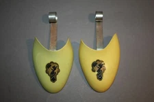 PAIR OF VINTAGE GREEN & YELLOW PLASTIC WOMENS SHOE KEEPERS