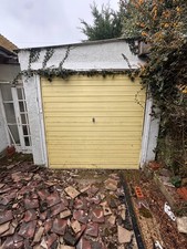 Manual sliding garage door