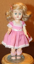 Vintage 1950's 8” plastic “Ginger” walker doll By Cosmopolitan