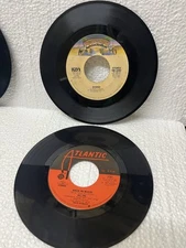 AC/DC back in Black kiss she’s so European excellent or better 45rm 7”