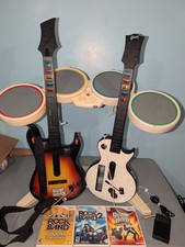 Wii Rock Band / Guitar Hero Video Game Bundle...