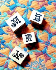RUBBER STAMPS Set of four wood-backed rubber stamps with initials M, N, n and E