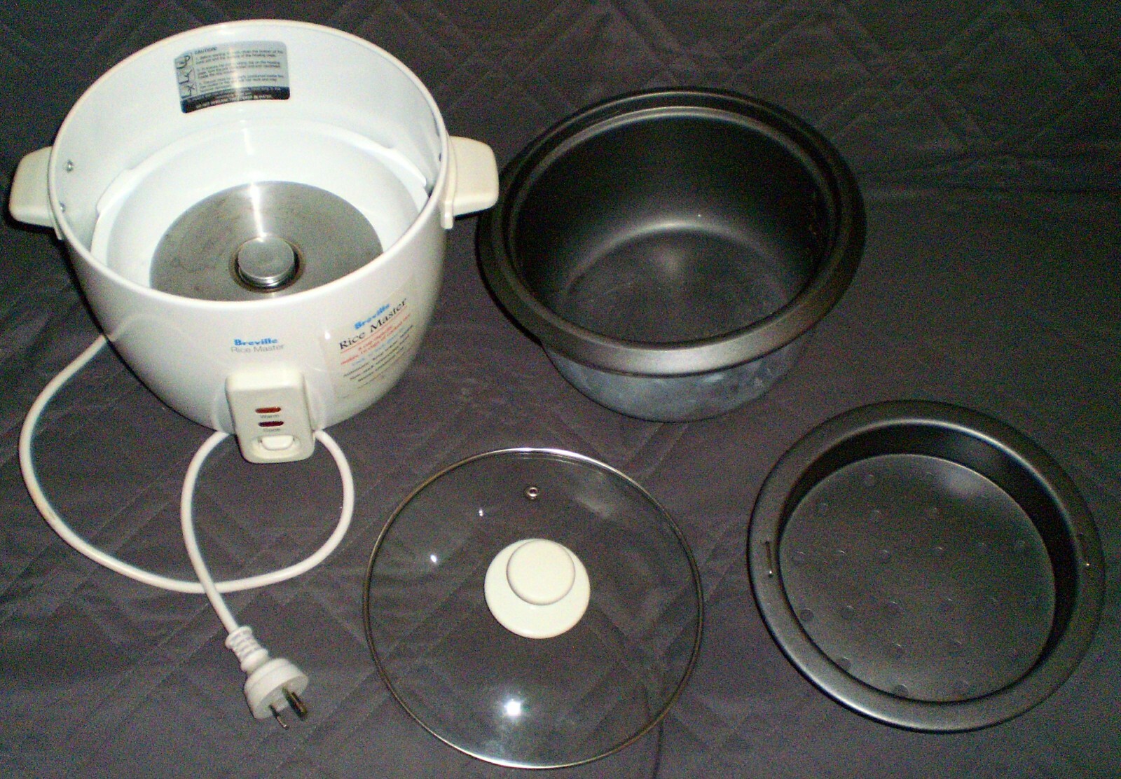 White Breville Rice Master RC12 Rice Cooker with 8 cup capacity