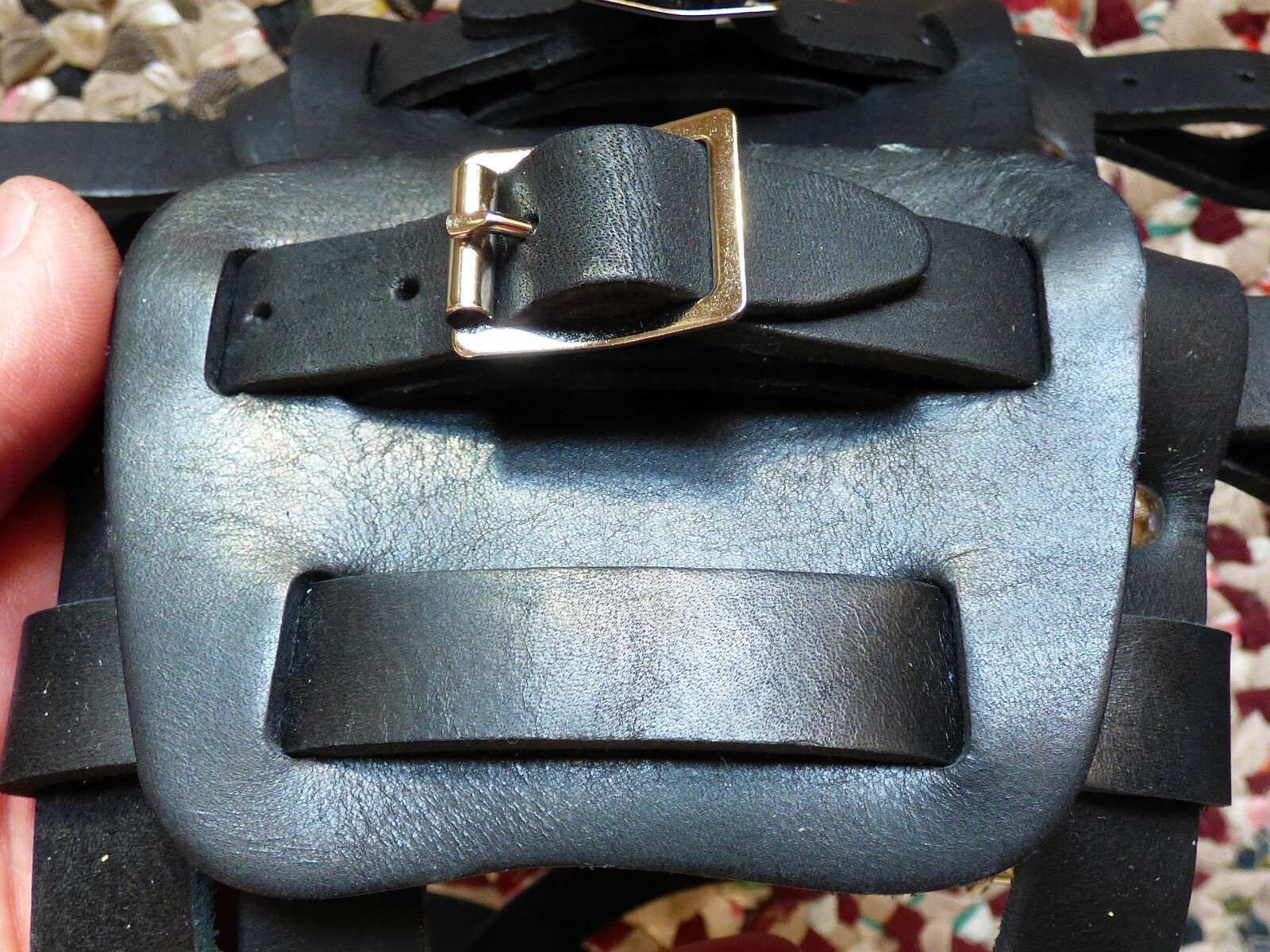 Brand new pair of black colored leather bindings for snowshoes