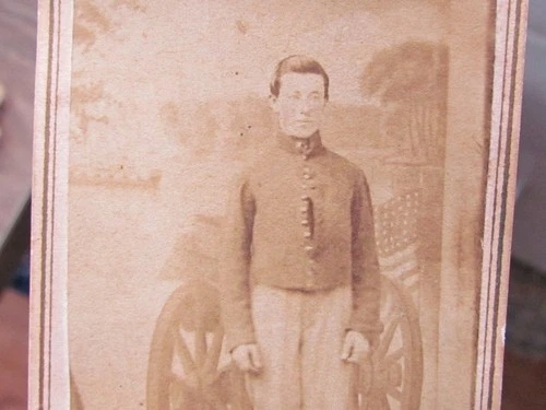Lancaster Pennsylvania Civil War soldier in front of military backdrop cdv photo