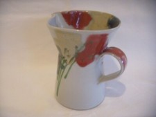 A Retro Janice Tchalenko Dartington Pottery poppy pitcher / jug