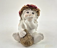 Dreamsicles Figurine #10786 “Kisses 'n Wishes” – Cherub Angel Blowing a Kiss 💋