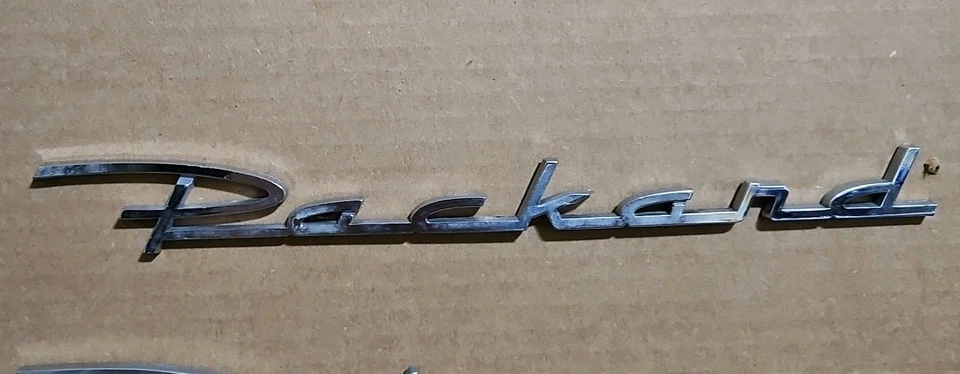 Packard Patrician 1954 emblemas traseros cromados parte # 448671 usado Foto 2 de 4