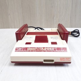 Japanese original Famicom in box with 8 games Family Computer HVC-001 1983 CIB