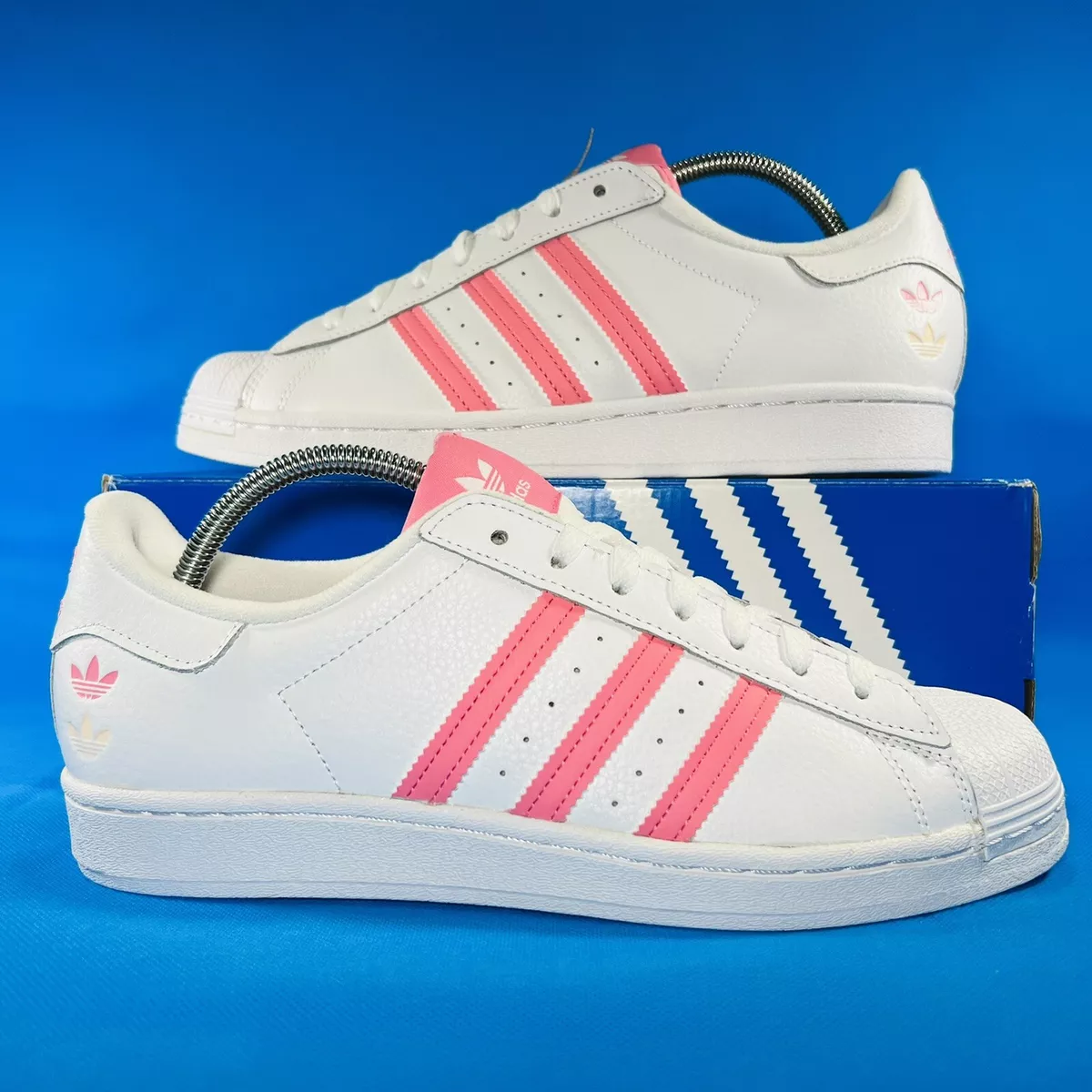 White and on sale pink adidas trainers