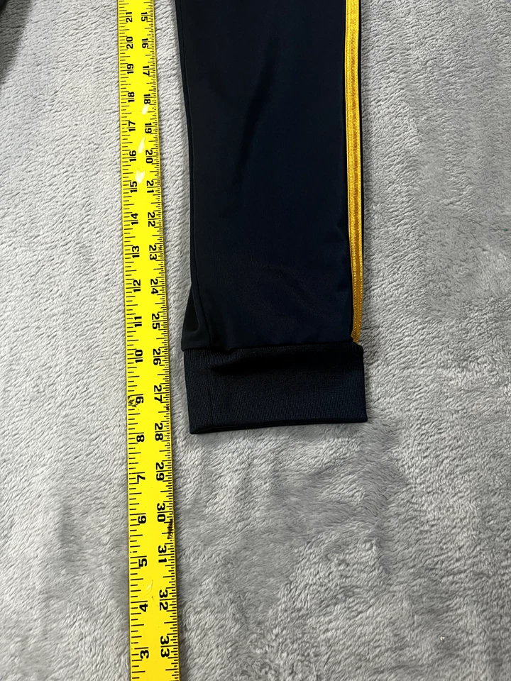 Pantalones deportivos Adidas talla grande azul marino con rayas doradas usados en excelente estado Foto 3 de 4