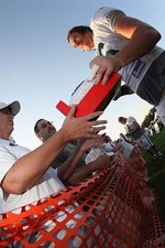 Guard Alan Faneca New York Jets signs autographs after the Green A- 2009 Photo