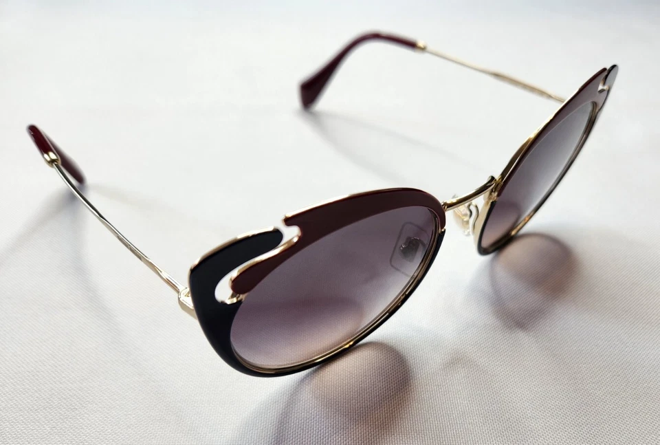 GAFAS DE SOL MIU MU 57TS HB5-GR0 AZUL GRANATE DORADO OJO DE GATO con LENTE ESPEJO ITALIA Foto 2 de 4