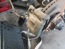 FRONT LEFT BRAKE CALIPER / 180914 FOR NISSAN PICK UP D22 2.5 DCI 4WD