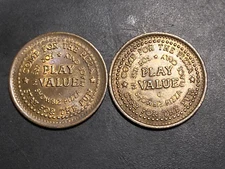 2 Different Showbiz Pizza Place Tokens