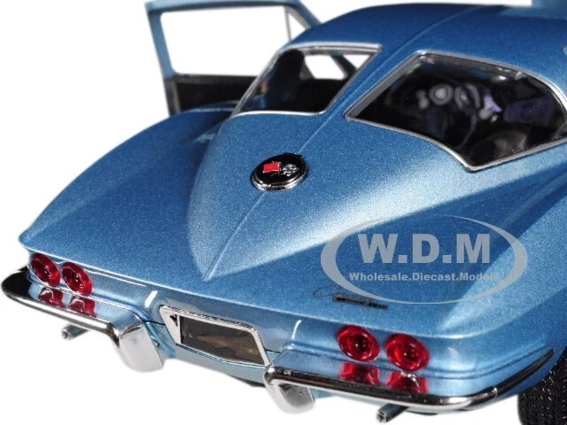1963 CHEVROLET CORVETTE LIGHT BLUE 1/24-1/27 DIECAST MODEL CAR BY WELLY 24073 - Image 3 of 4