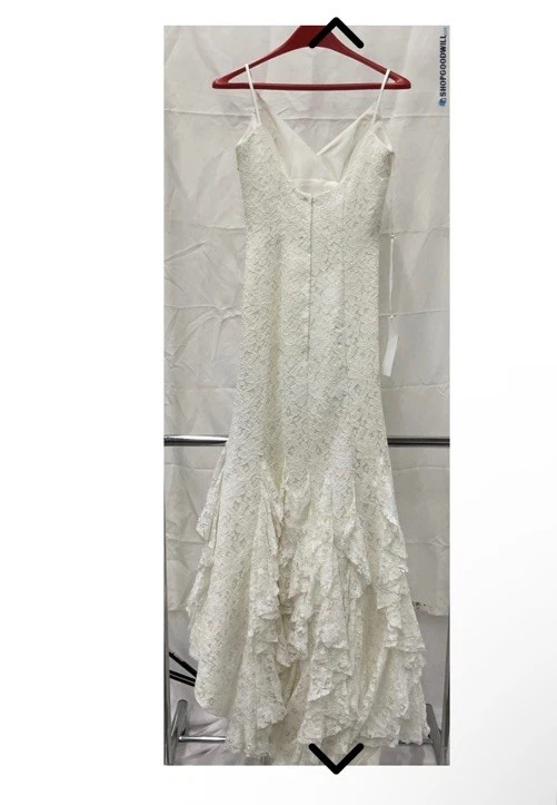 Vestido de novia de encaje con tren Foto 2 de 4