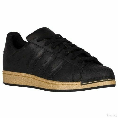 black with gold shell toe