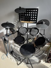 Alesis Nitro Electronic Drum Kit 8-Piece with Mesh Heads. Headphones Included.
