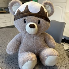 CLINTONS  CHRISTMAS TEDDY BEAR WEARING A  XMAS PUDDING HAT 13” 