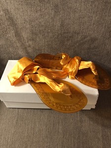 orange tie up sandals