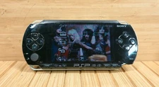 Sony PSP-1001b2 Playstation Portable Console w/ 4 games, charger adapter, case
