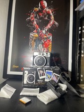 FujiFilm Instax Mini 90 Box, plus Ladegerät, plus Gurte, plus Anleitung