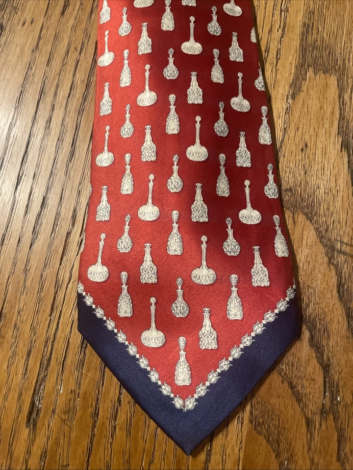 Corbata de seda con tema botella de perfume Gianfranco Ferre usada en excelente estado hecha en Italia Foto 3 de 4