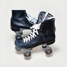 Vintage Black Indoor Quad Roller Skates with White Laces and ROLLER DERBY Wheel