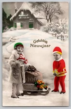 Happy New Year Little Girl Boy Sled Winter Hand Tinted RPPC Real Photo c1910-20s