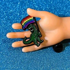 Pride T-Rex Enamel Pin – Fierce & Fabulous LGBTQ+ Dino