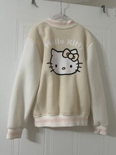 Hello Kitty Girl's Snap-Up Front Fleece Varsity Jacket Cyan/White Size:. 8/10