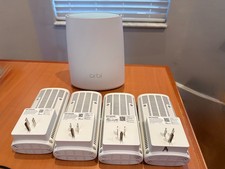 Netgear Orbi Router RBR40 plus 4 Orbi RBW30 Satellites