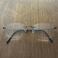 Marchon Airlock 2 Silver Rimless Oval Glasses Thin Temple 760 32 140