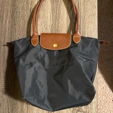 Longchamp Tote Bag with Leather Handles and Gold Accents