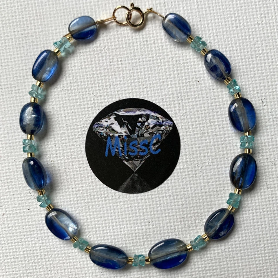 PULSEIRA DE OURO 9 QUILATES CIANITA E ÁGUA-MARINHA, FEITA À MÃO NO REINO UNIDO POR MISSC, ESTAMPADA 375 - Imagem 2 de 4