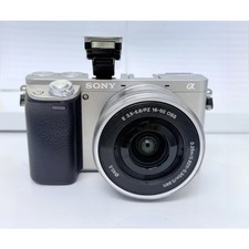 Sony Alpha A6000 Mirrorless Digital Camera Silver w/ 16-50mm Lens w/ Accessories