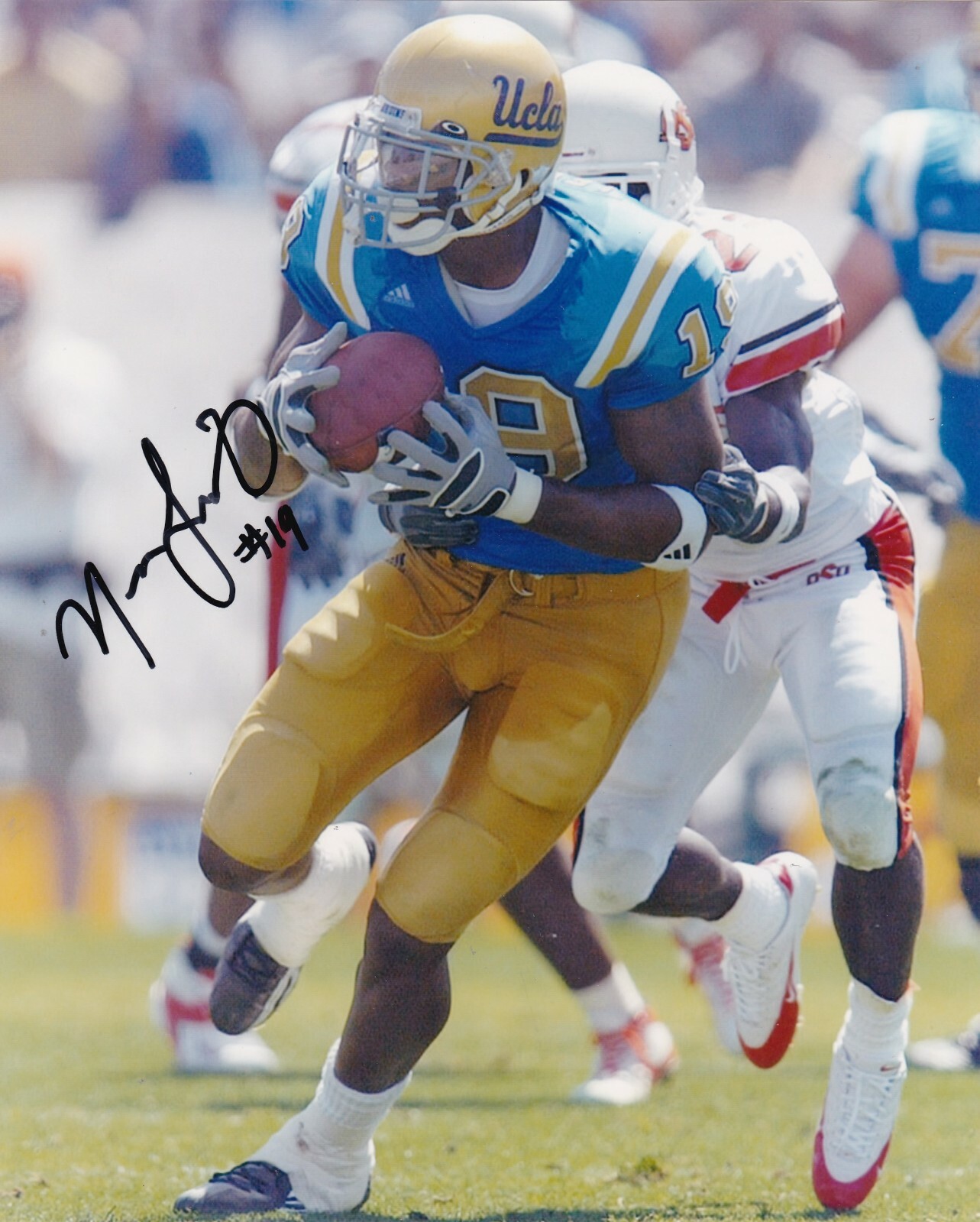 MARCEDES LEWIS UCLA BRUINS ACTION SIGNED 8X10 