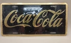 Vintage 1996 Coca-Cola Metal Novelty License Plate Black Gold Script Lettering