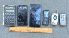 Vintage and modern cell phones and calculate. 6 items in all, sold as is.