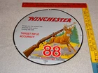 VINTAGE 1955 WINCHESTER RIFLE DEER HUNTING 11 3/4” PORCELAIN METAL GUN, GAS SIGN