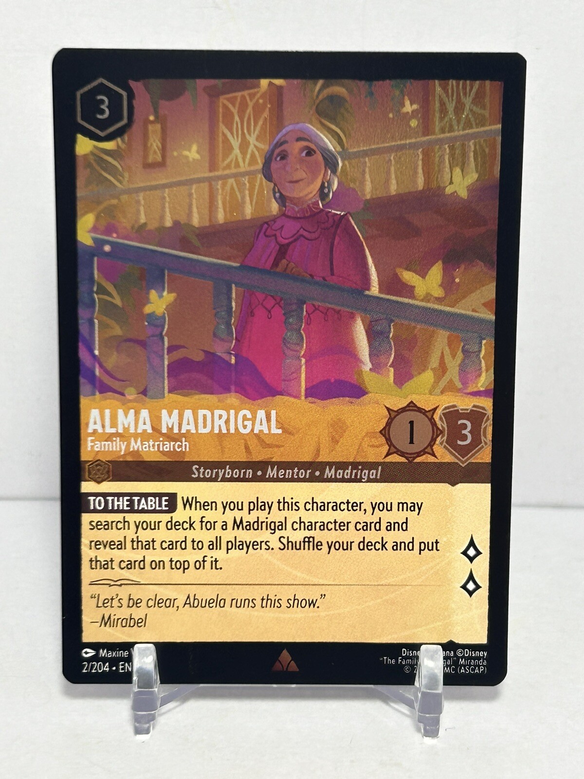 Disney Lorcana Ursula’s Return Alma Madrigal Family Matriarch Foil 2/204 NM
