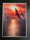 A4 Photograph, 2014 2 Lancasters at Sun Set. Signed by 5 WW 2 Veterans
