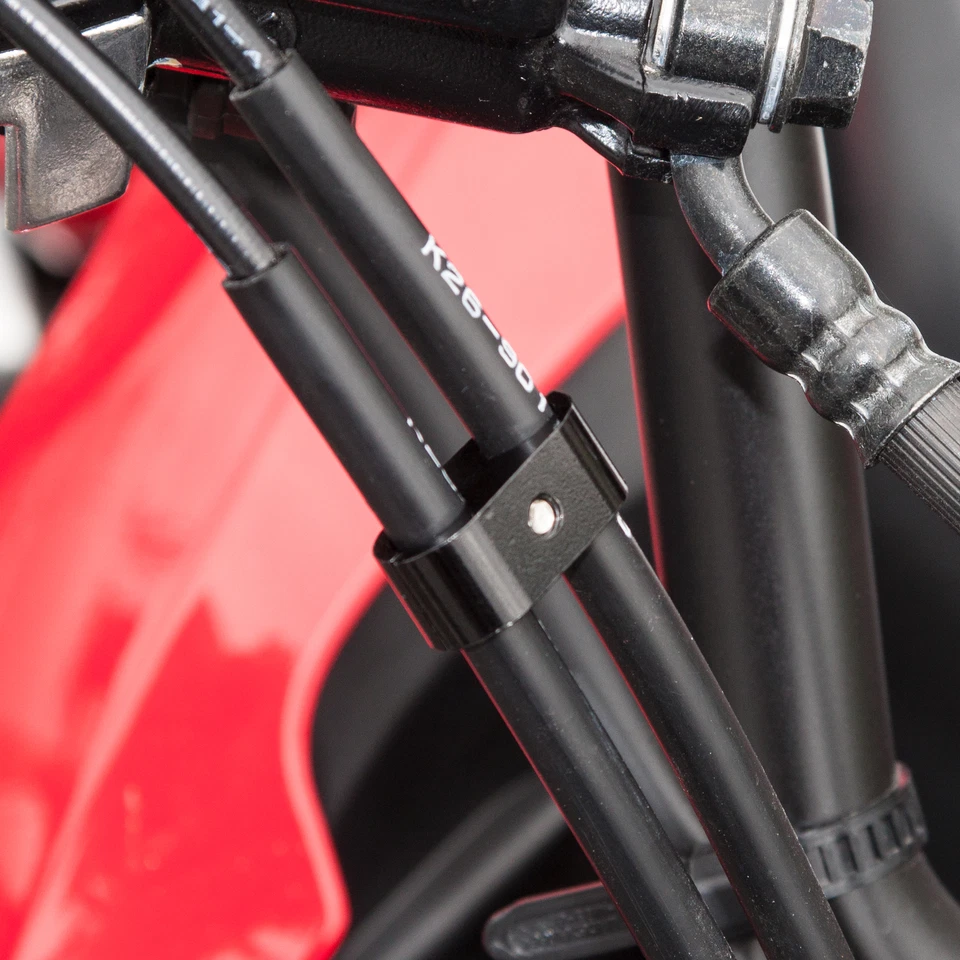 Abrazadera de cable de acelerador negro universal espaciador de línea de freno para motocicleta Foto 3 de 3